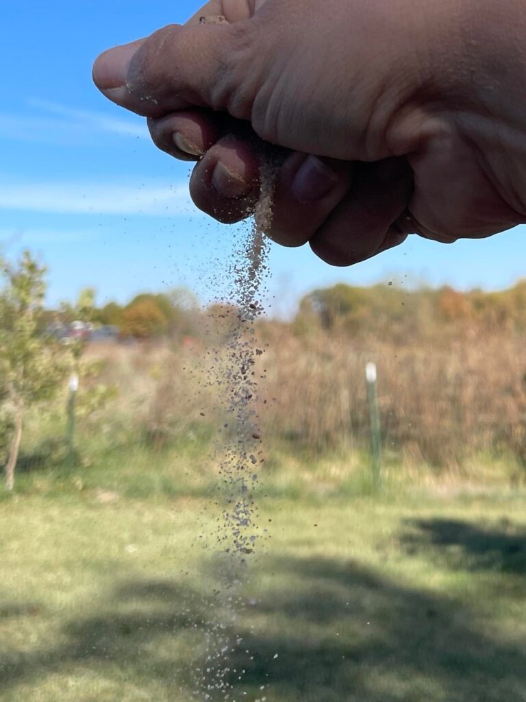 sand falling from a closed fist