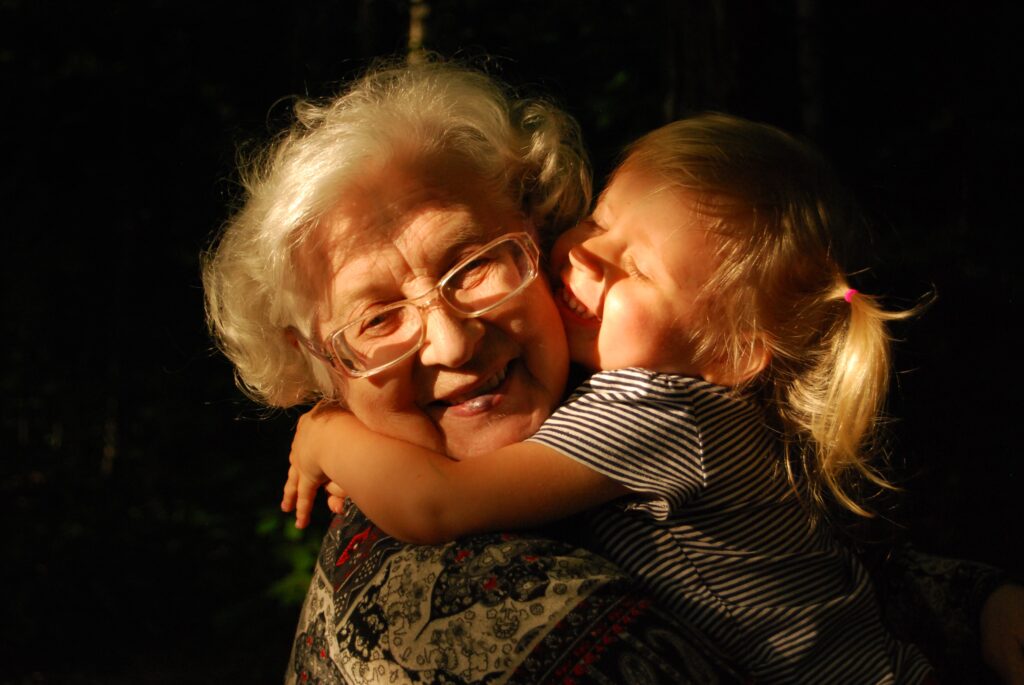 little girl hugging her grandma