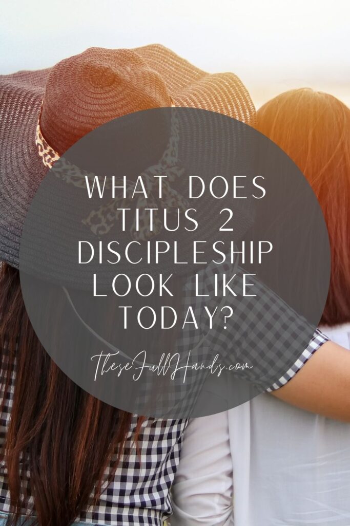 Pinterest pin of back of two girls with title What Does Titus 2 Discipleship Look Like Today