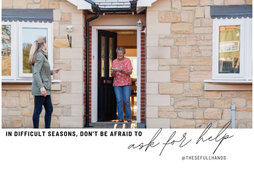 woman delivering meal to elderly neighbor for meal planning in difficult seasons