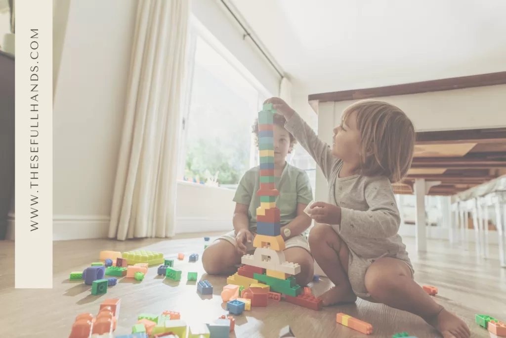 in-home daycare toddlers playing with blocks