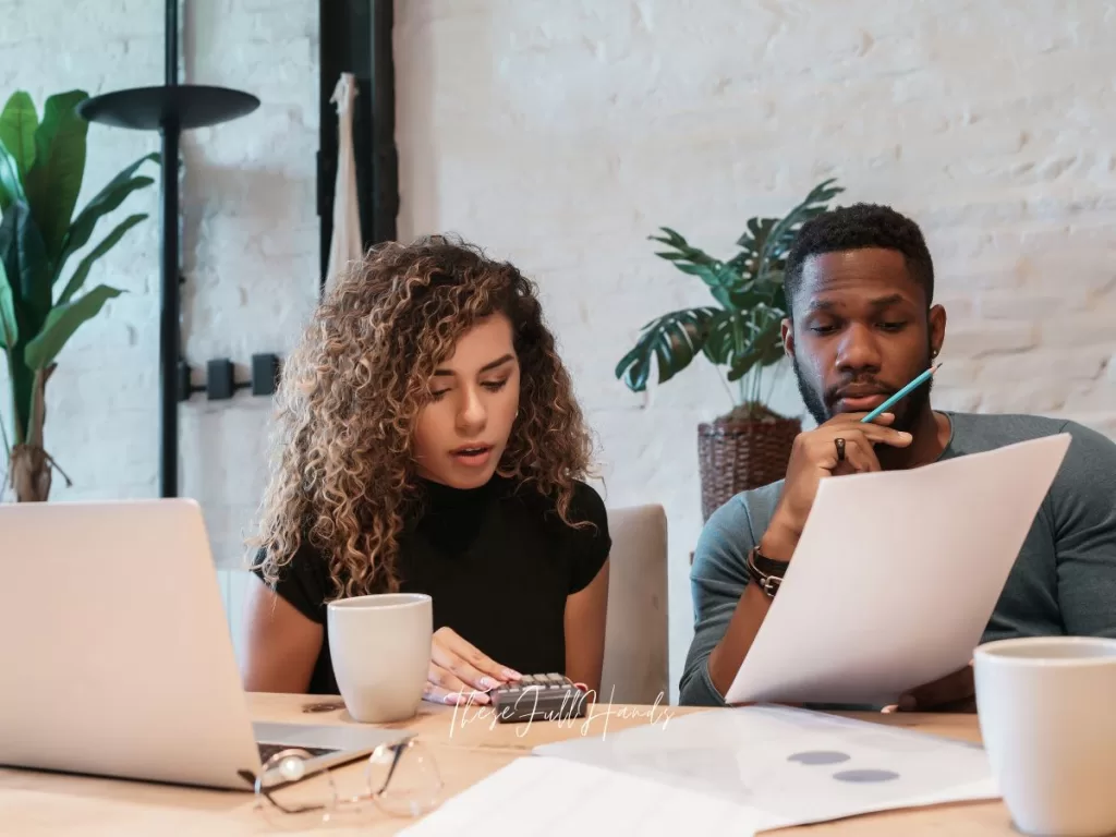 husband and wife managing money and their budget together