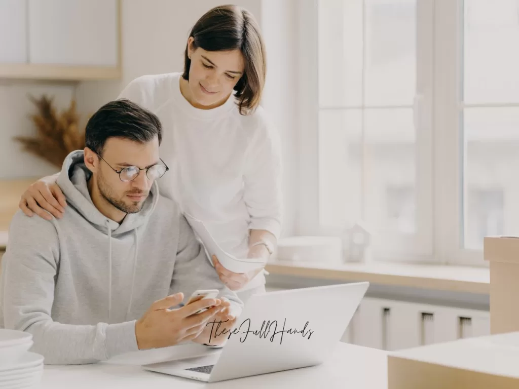 husband and wife handling money and budgeting together