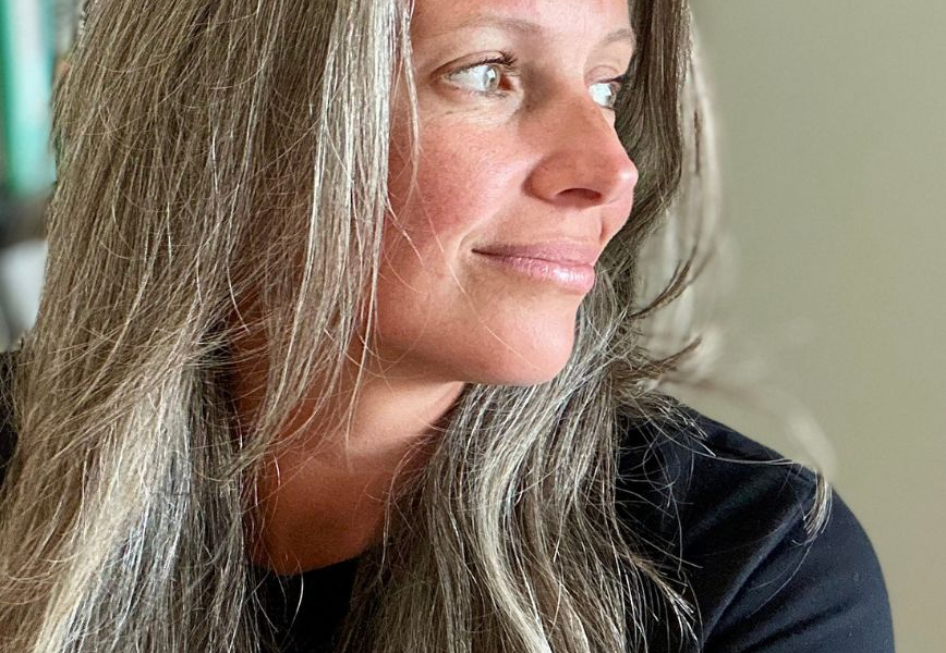 woman looking off camera, reset your life